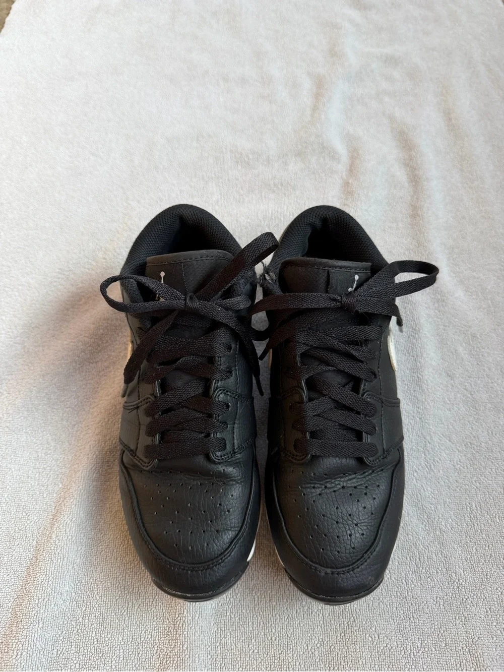 Nike Kids Black and White Baseball Cleats with Swoosh